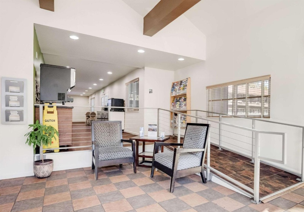 Efficiency Quadruple Room with Two Queen Beds - Non Smoking